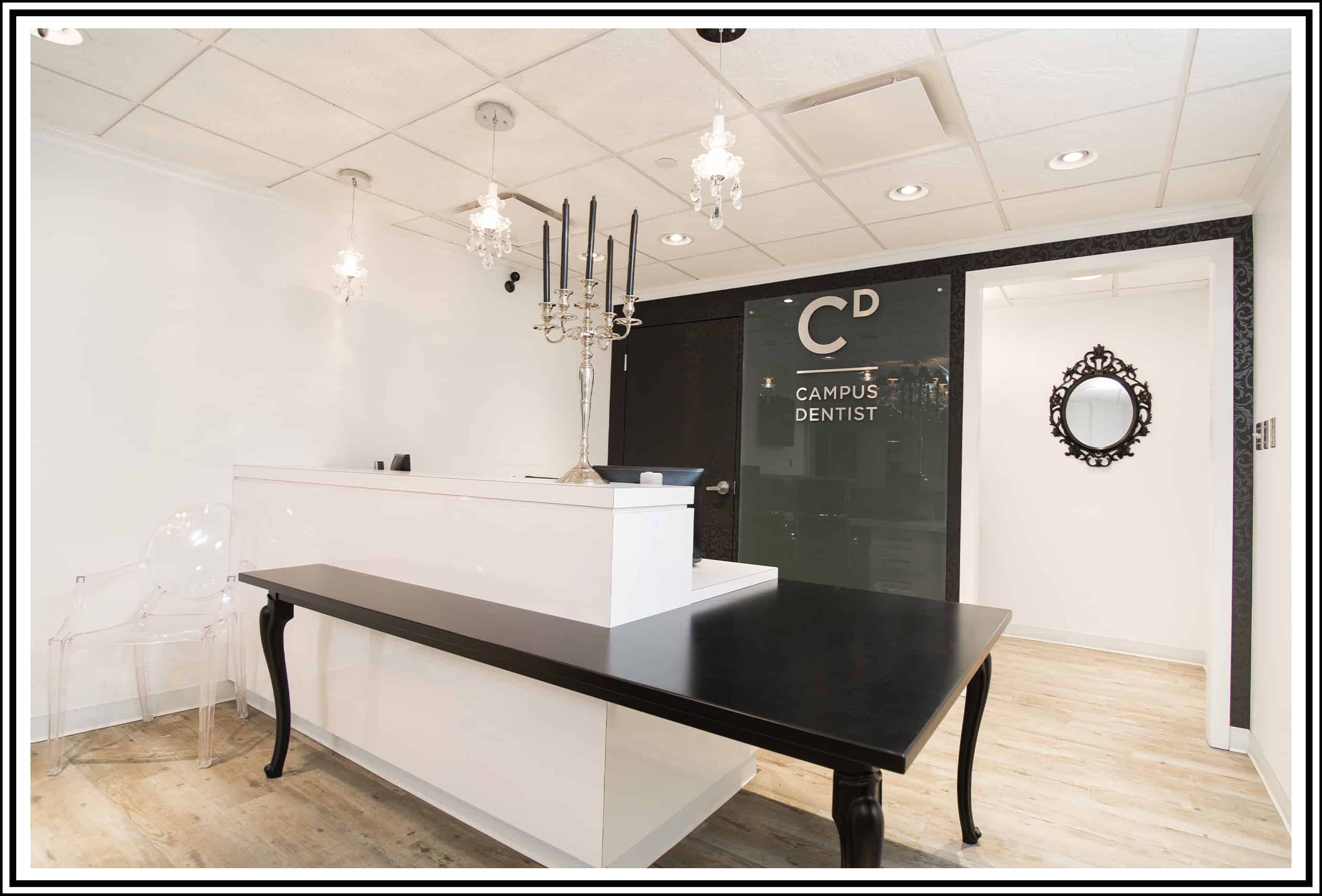 Reception desk with Campus Dentist branding